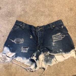 Highly distressed high rise jean shorts